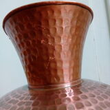 Dented copper vase or jug