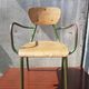 Former green metal child chair