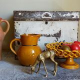 Yellow Provencal ceramic water pitcher with black net