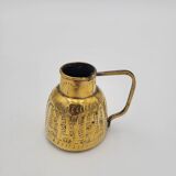 Persian jug in chiseled brass