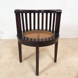 Colonial "Art Deco" armchair in wood and cane.