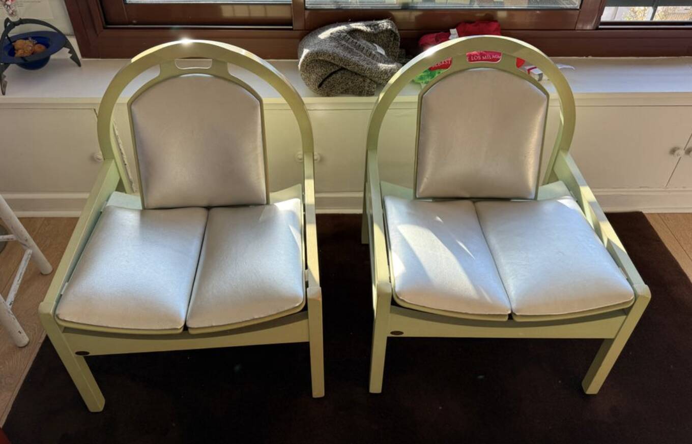 Pair of Argos armchairs by Baumann in green and silver leather.
