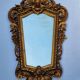 Antique wall mirror in carved gilded wood, Louis XV style, 19th century, 98 x 57 cm.