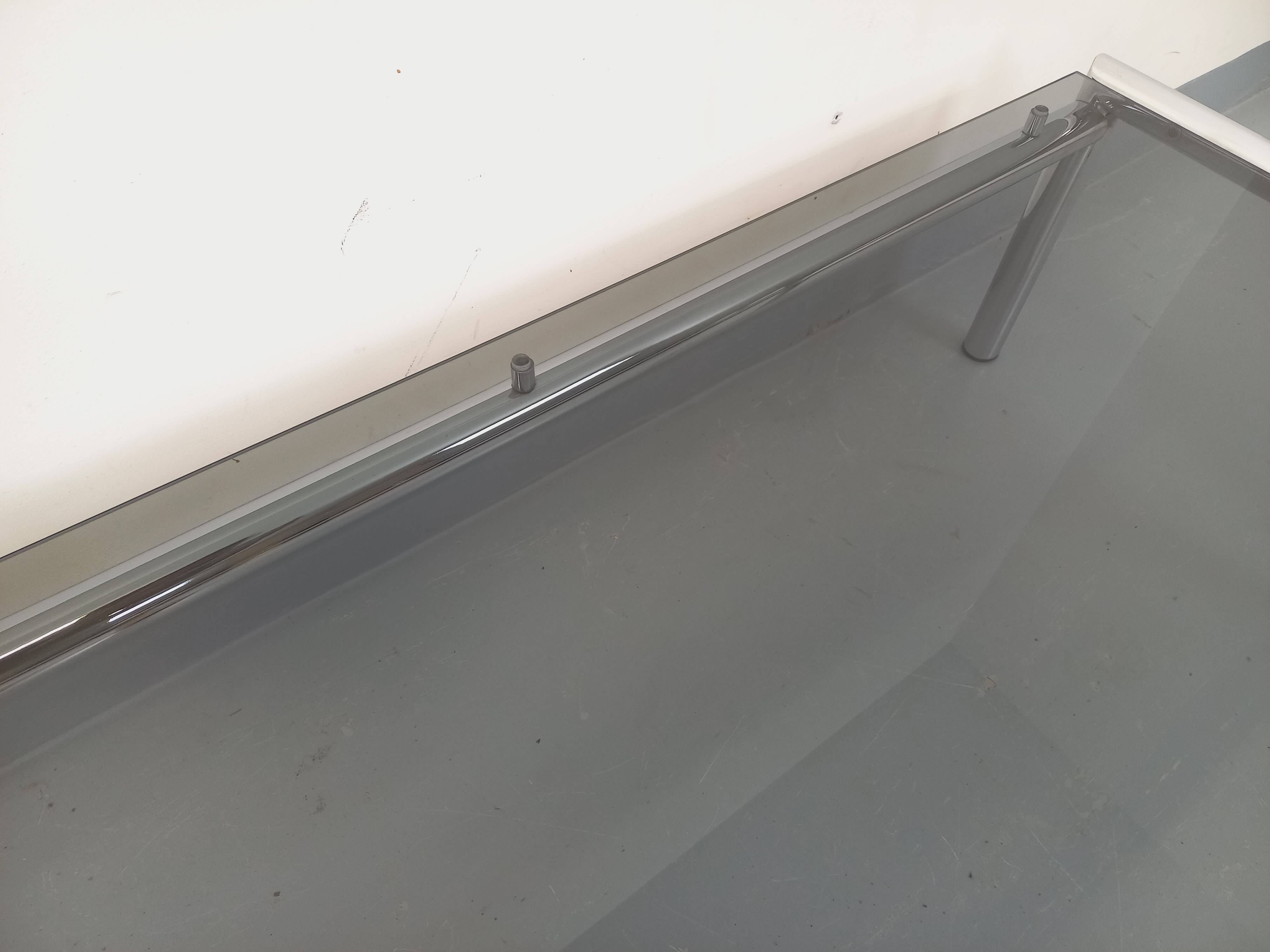 Vintage rectangular coffee table in smoked glass and chrome metal from the 1960s.