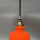 Suspension in orange opaline from the 1960s.