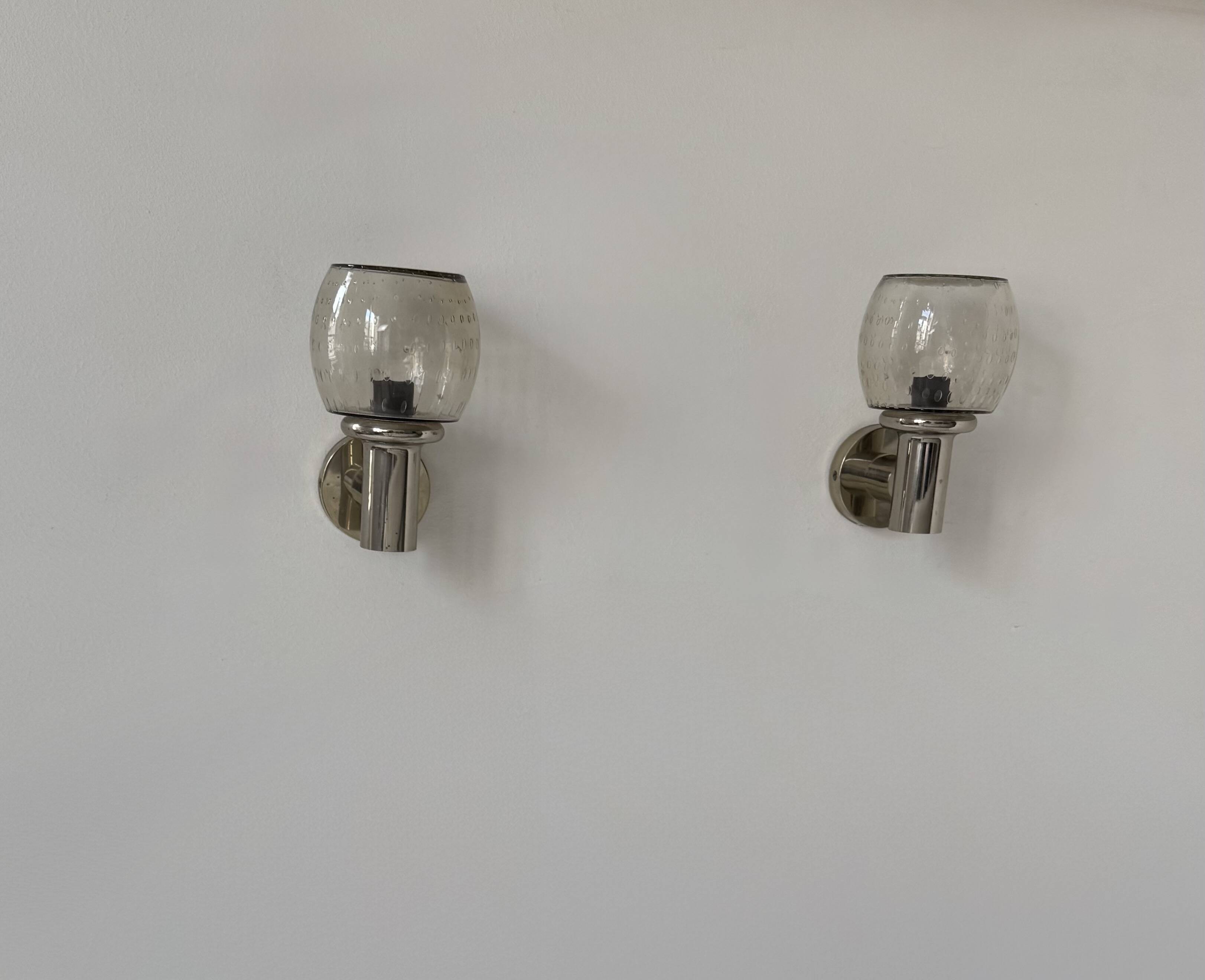 Pair of vintage wall lights, chromed metal and bubbled glass, France, 1960