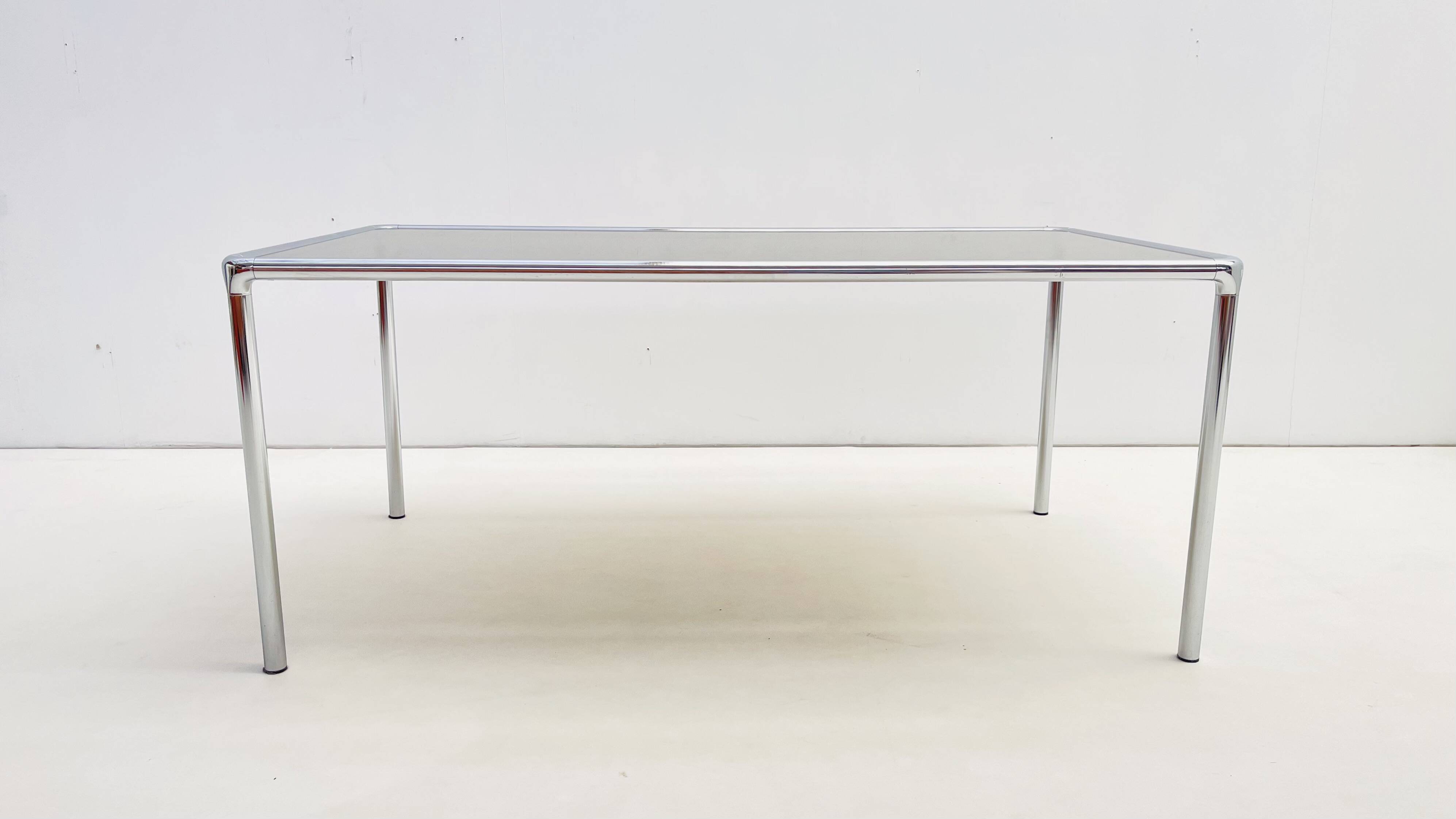 Etienne Fermigier - Dinning table in chrome and smoked glass