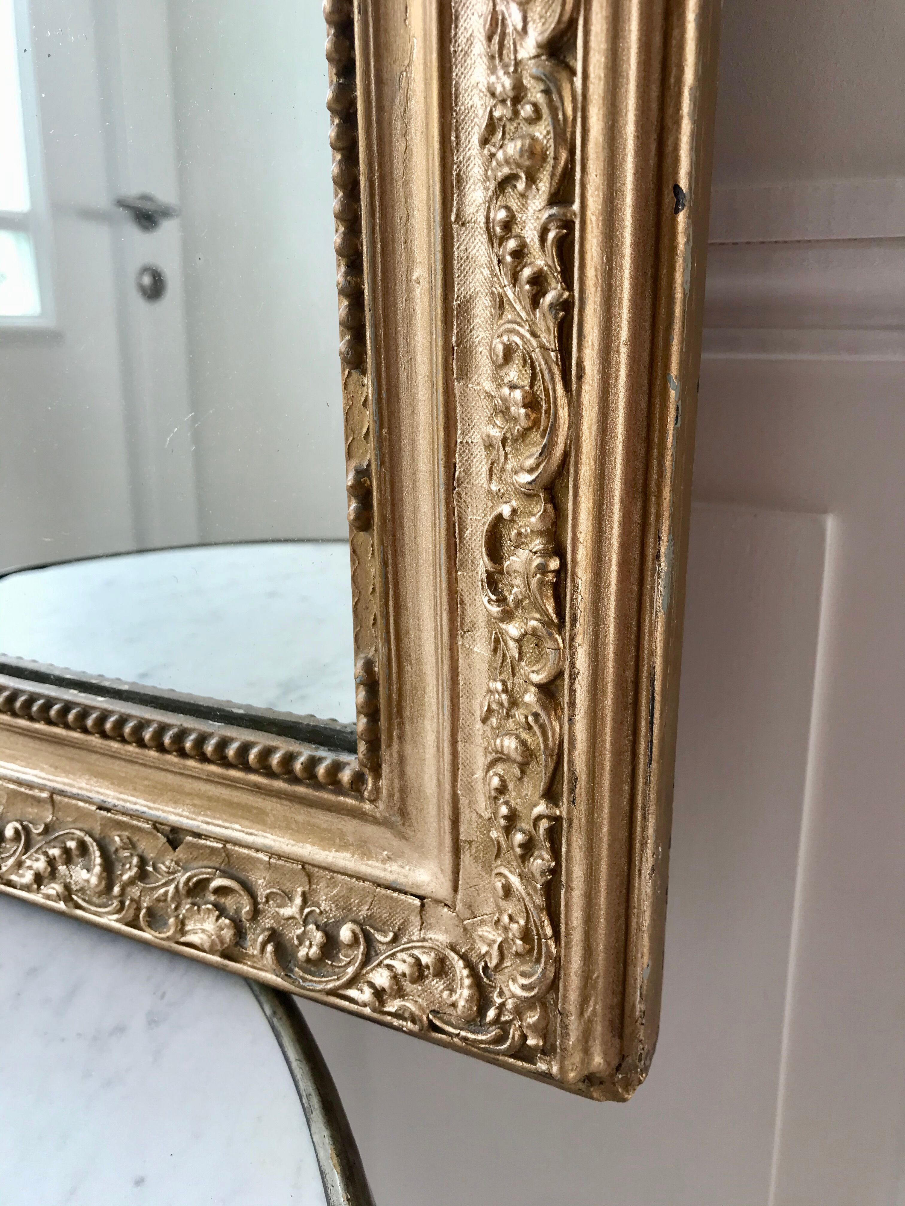Wooden mirror and gilded stucco early twentieth century