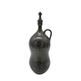 Bottle in iridescent green sandstone from the ceramist jean aimé Poirier