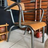 Old Mullca school chair with armrests