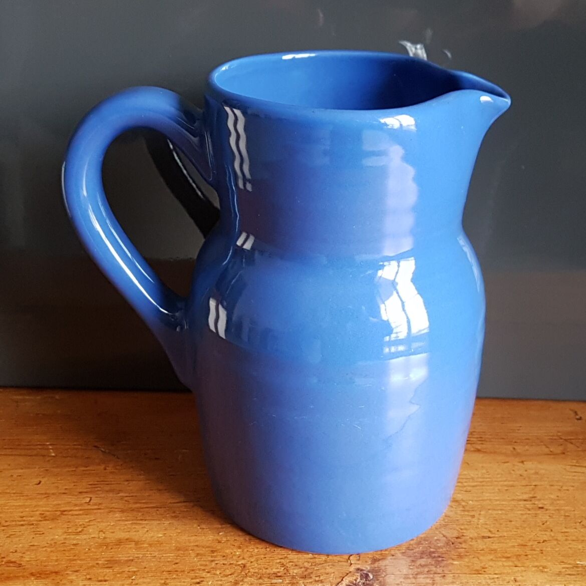 Blue ceramic pitcher