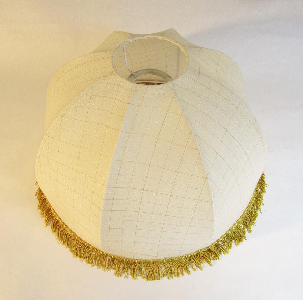 Cloth suspension with gold fringe