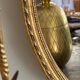Golden oval mirror 32x44cm