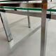 2 large nesting coffee tables in chrome and glass, 1970s design.
