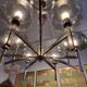 Timeless modern Scandinavian / mid-century chandelier in chrome and smoked glass.