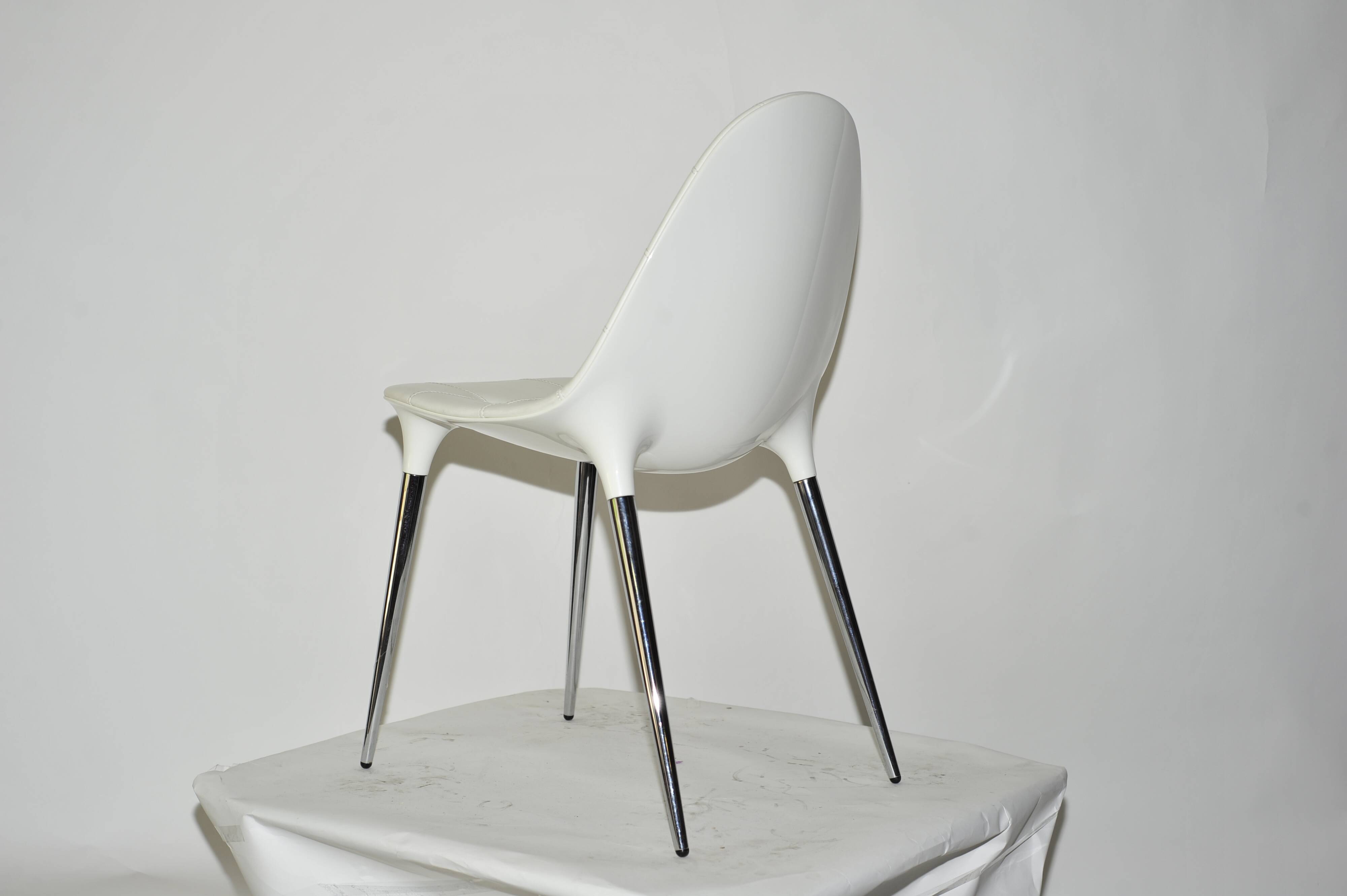 Caprice chair in white leather by Philippe Starck for Cassina