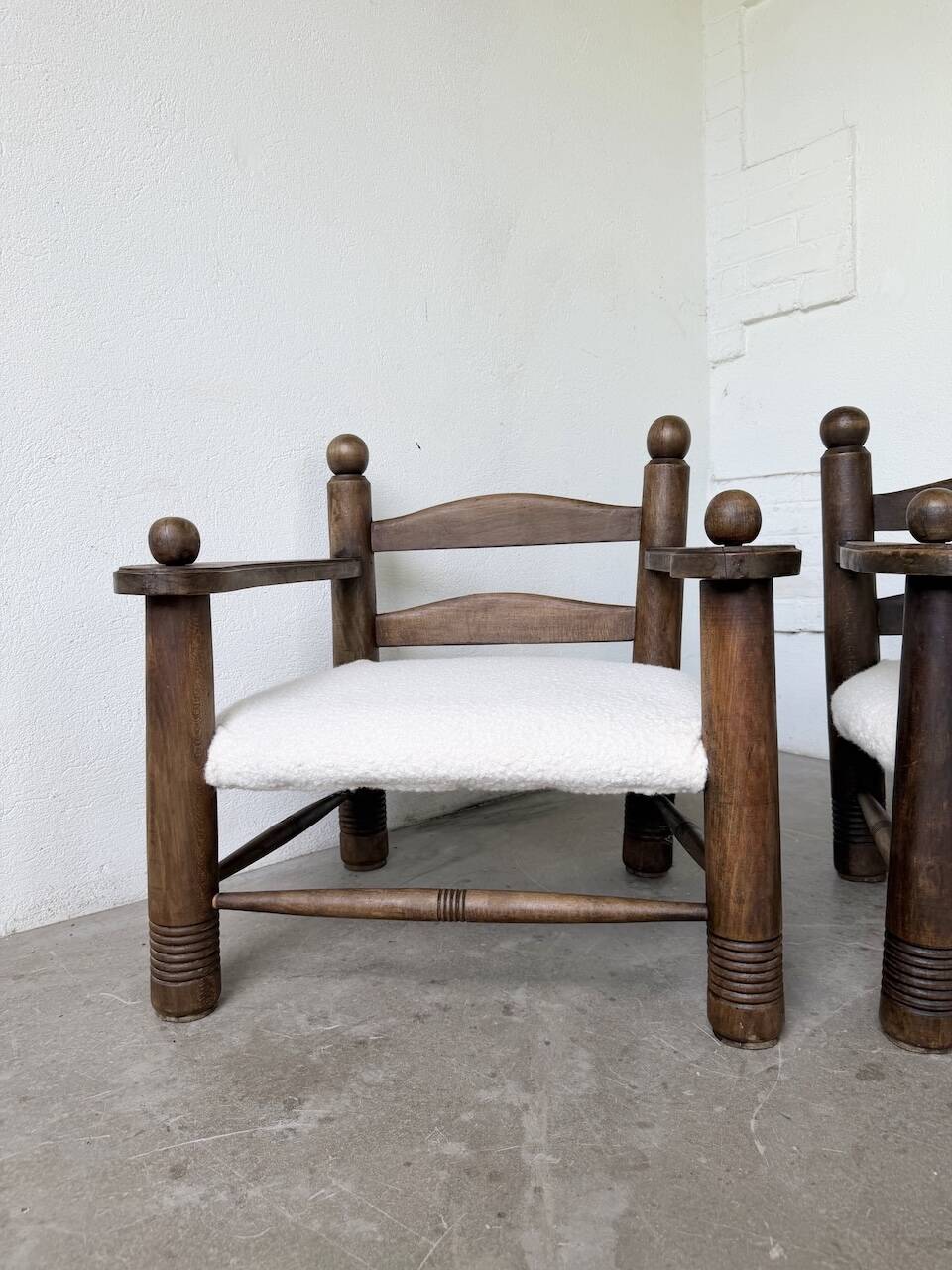 Pair of Dudouyt armchairs from the 1950s, oak.
