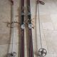 Old skis wooden and its pair of sticks