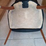 Pair of leather and wood armchairs in the Umberto Asnago style.