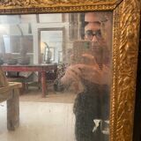 Old mirror in gilded wood
