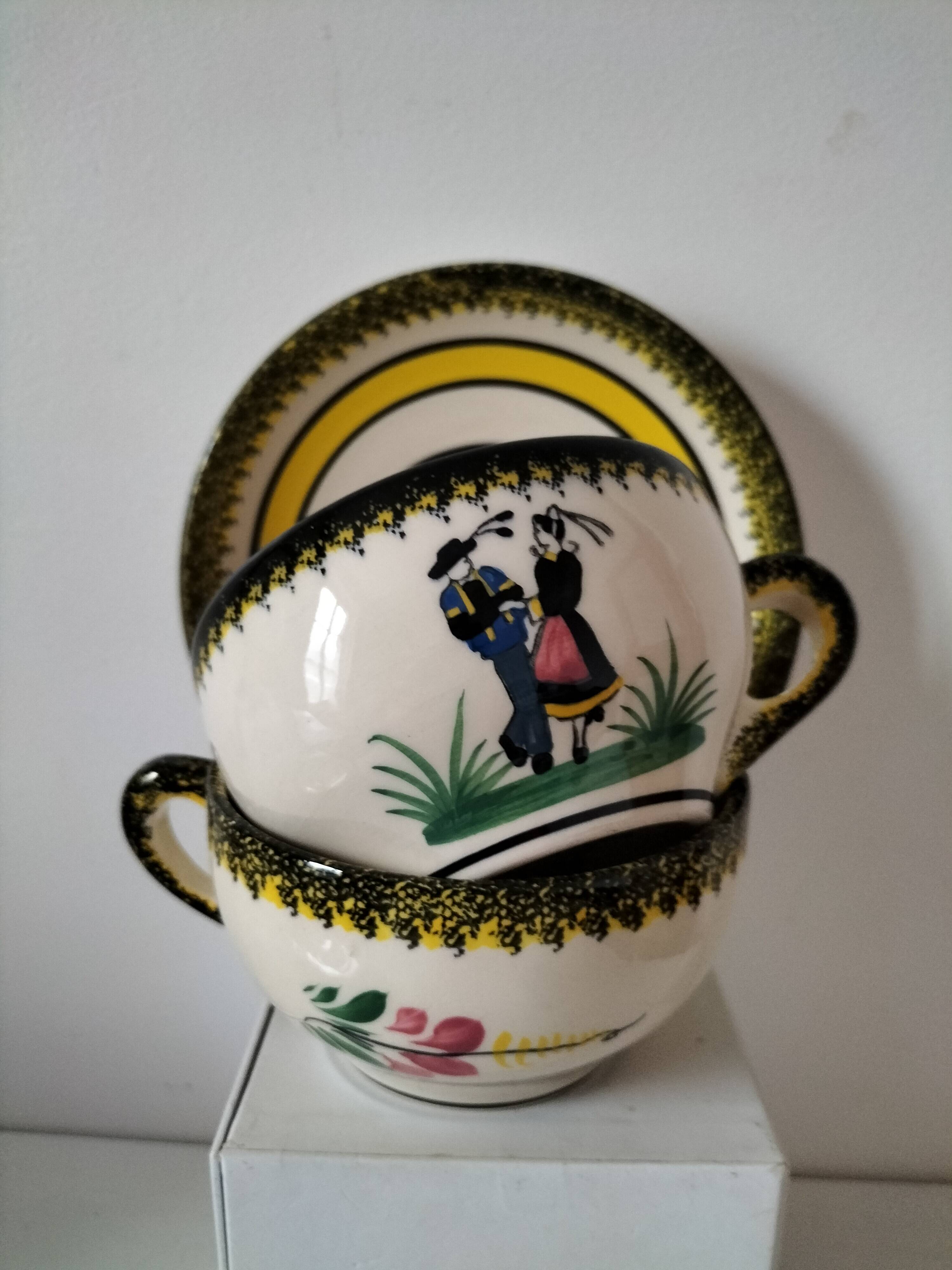 Two Henriot Quimper cups and saucers