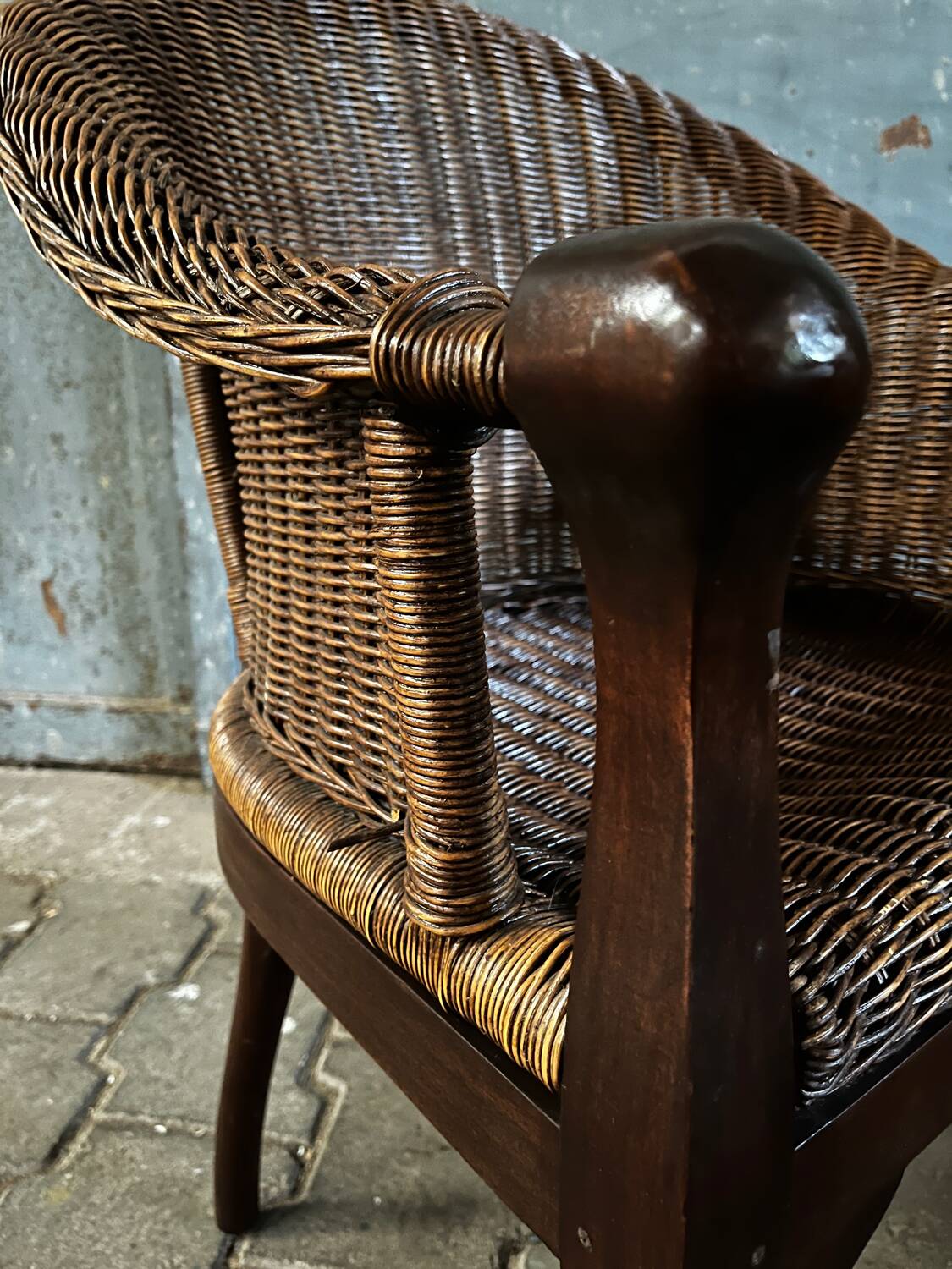 Arm chairs in dark rattan