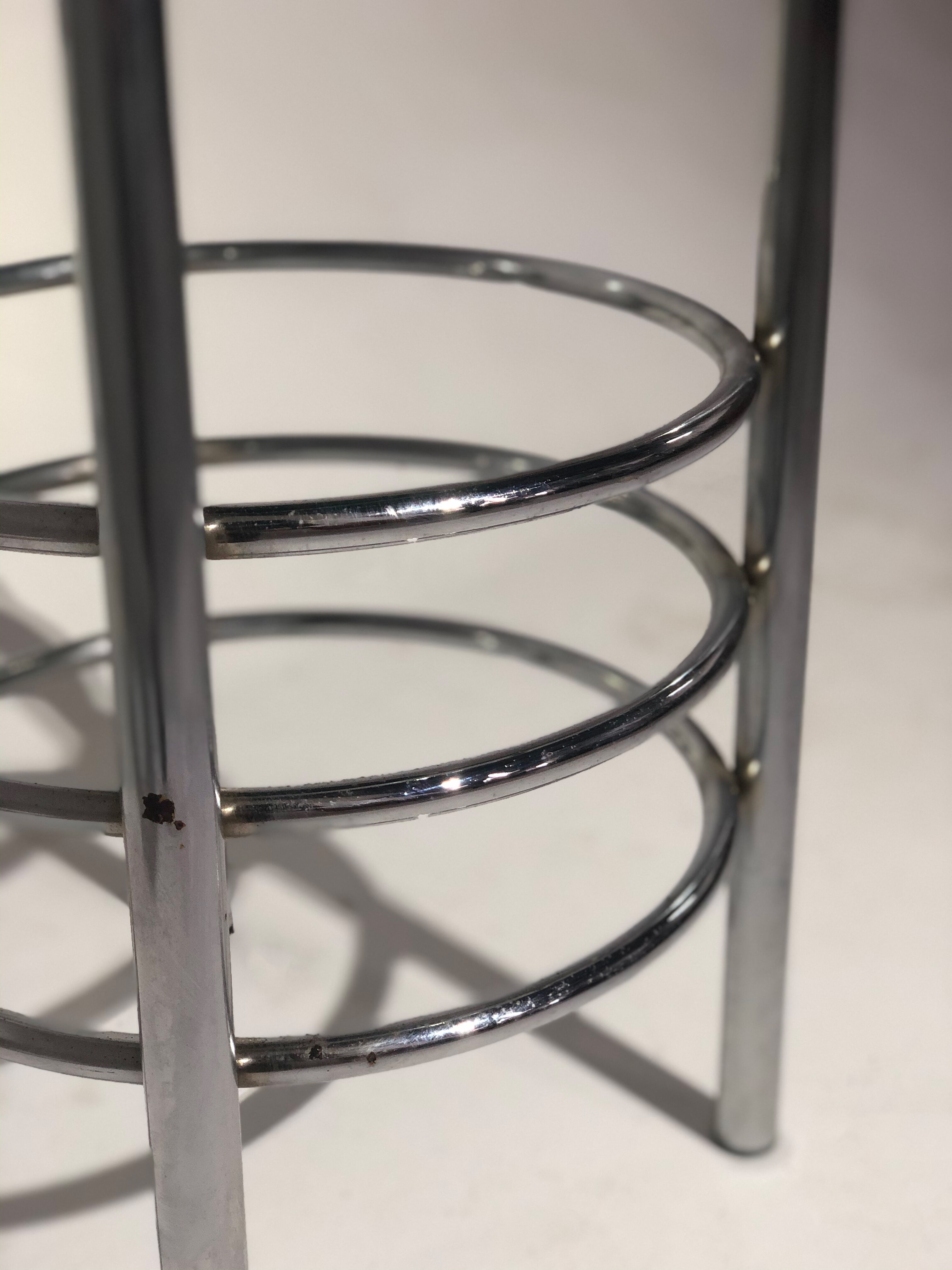 Contemporary aluminum stool and green/blue velvet