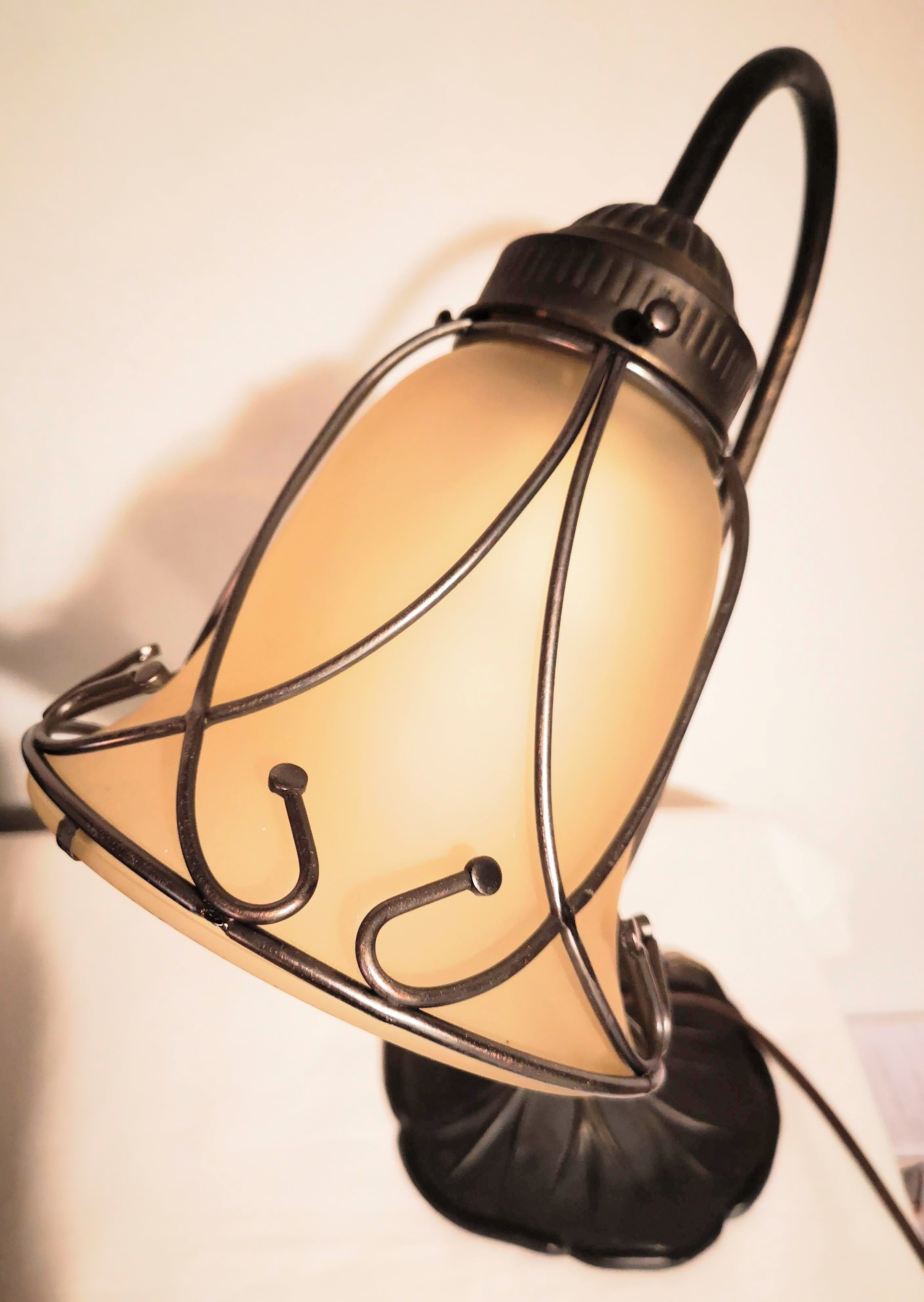 Aged metal and tulip glass