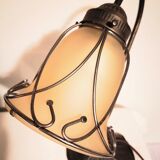 Aged metal and tulip glass