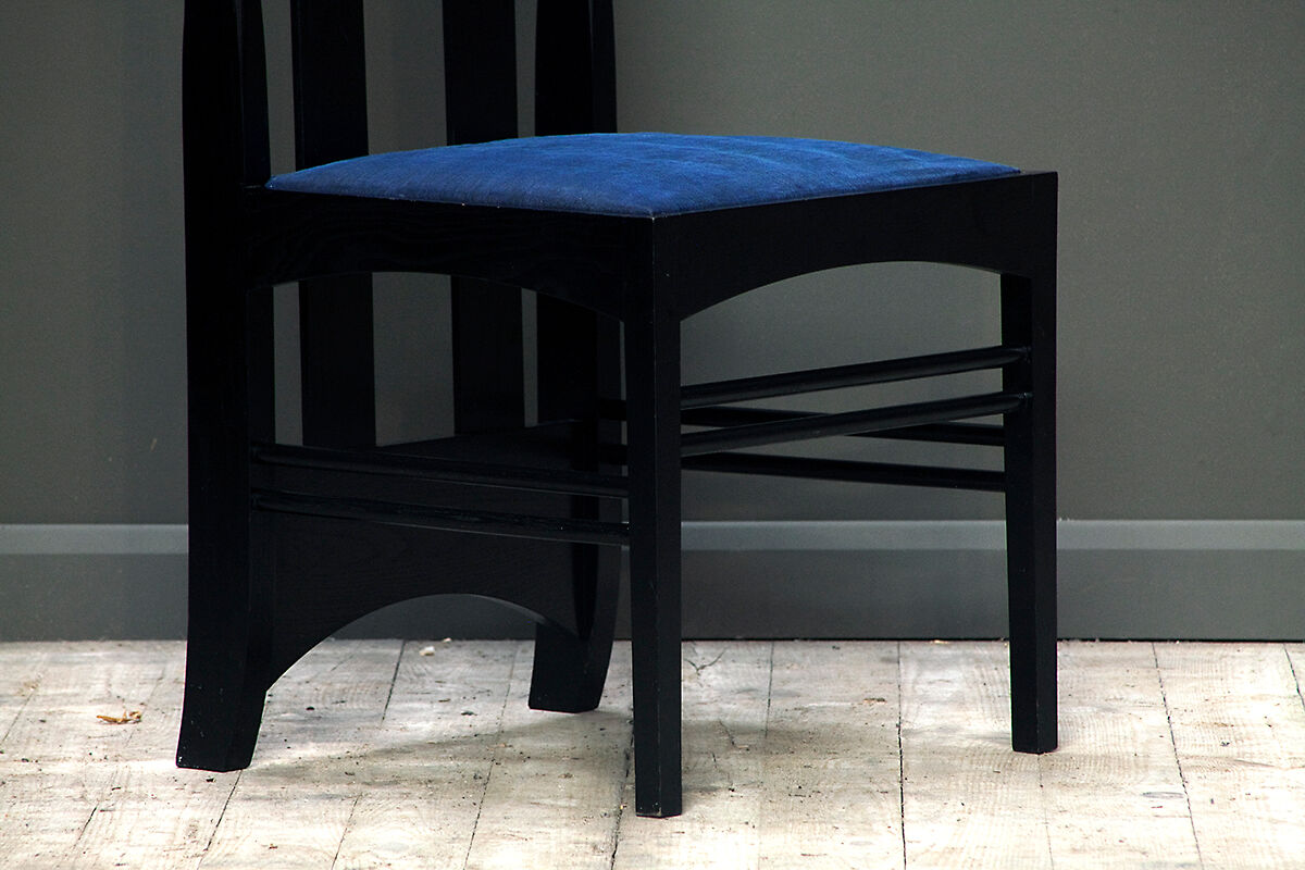 Argyle Chair designed by Charles Rennie Mackintosh. Produced by Cassina