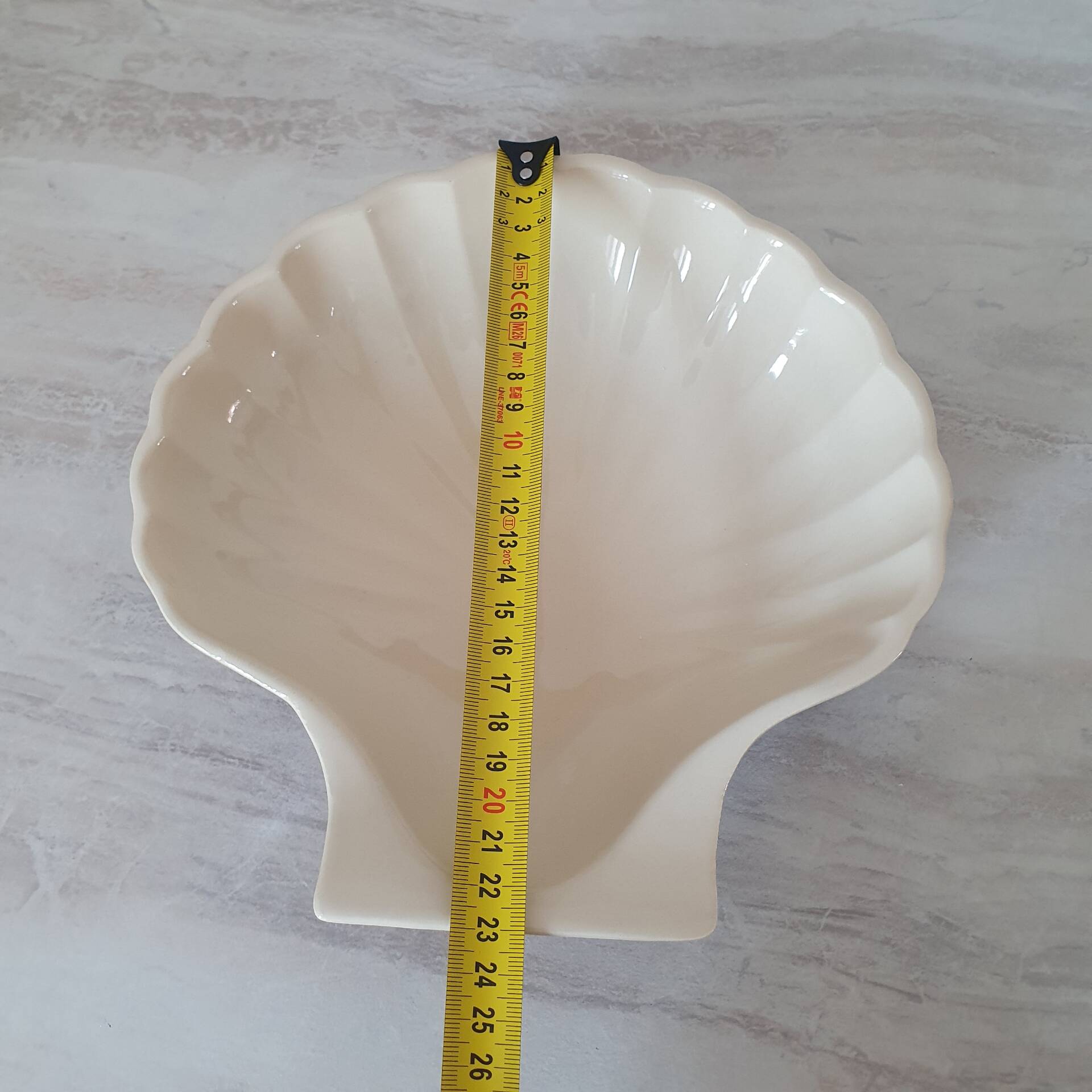 Brown and white ceramic shell bowl