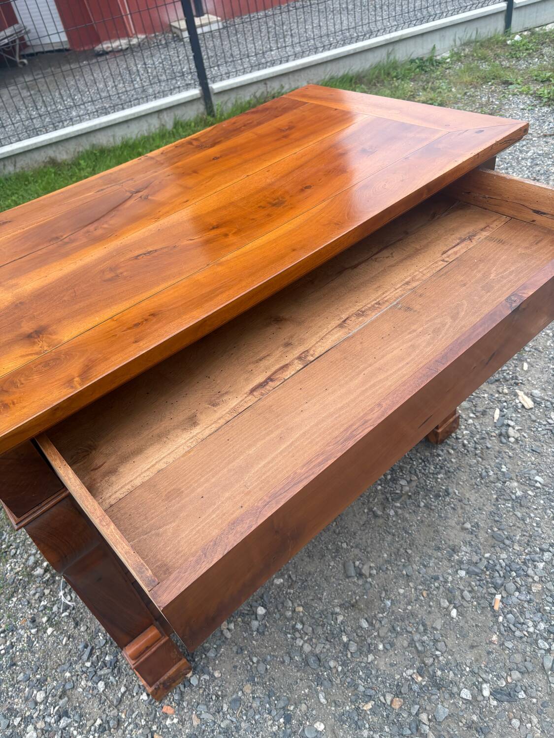 Restoration period walnut chest of drawers with a scroll handle