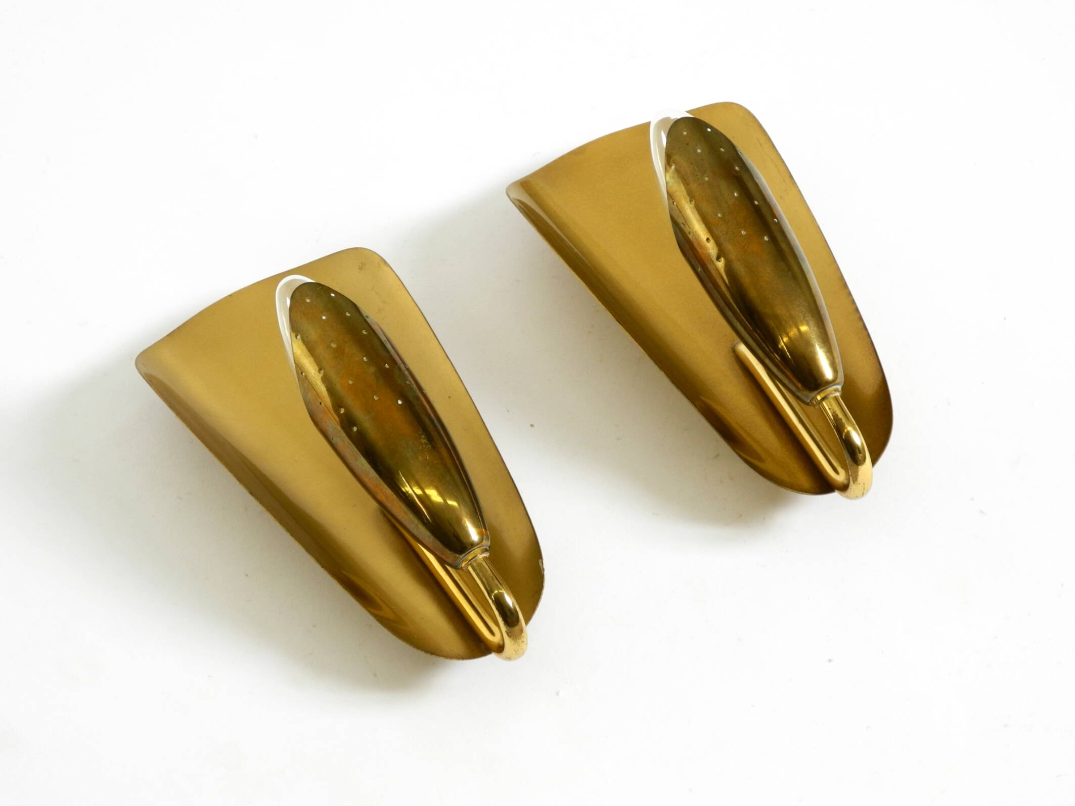 Two enchanting original Swedish Mid Century Modern brass wall lamps
