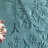 Ancient linen and emerald-tinged cotton