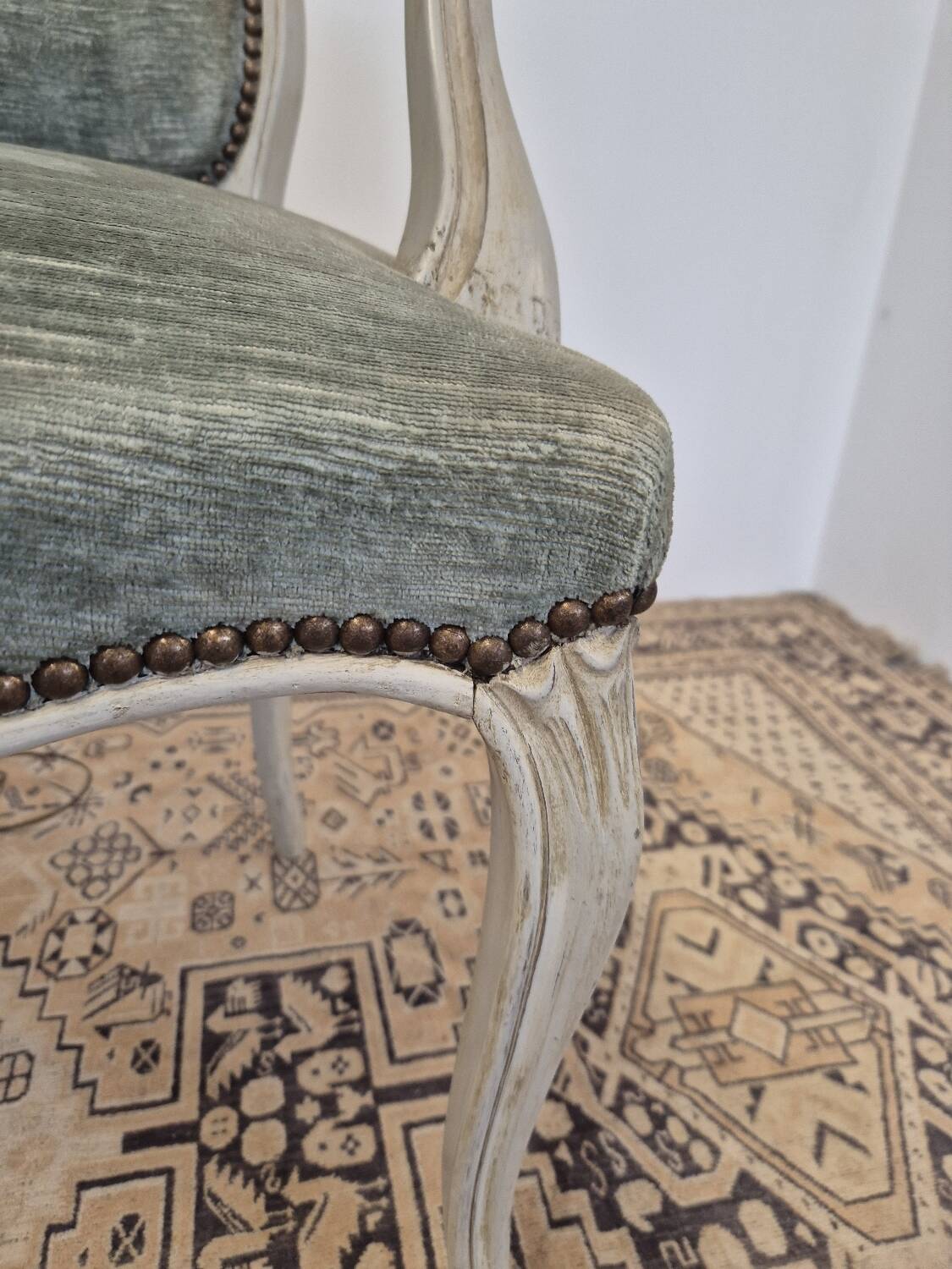 Louis XV style cabriolet armchair in patinated wood and velvet