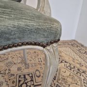 Louis XV style cabriolet armchair in patinated wood and velvet