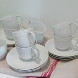 Set of 9 white porcelain coffee cups