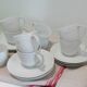 Set of 9 white porcelain coffee cups
