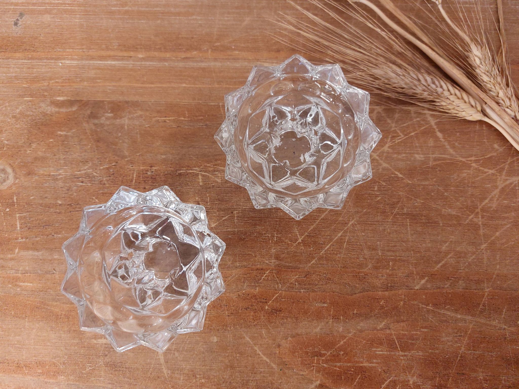Pair of star pattern glass candle holders