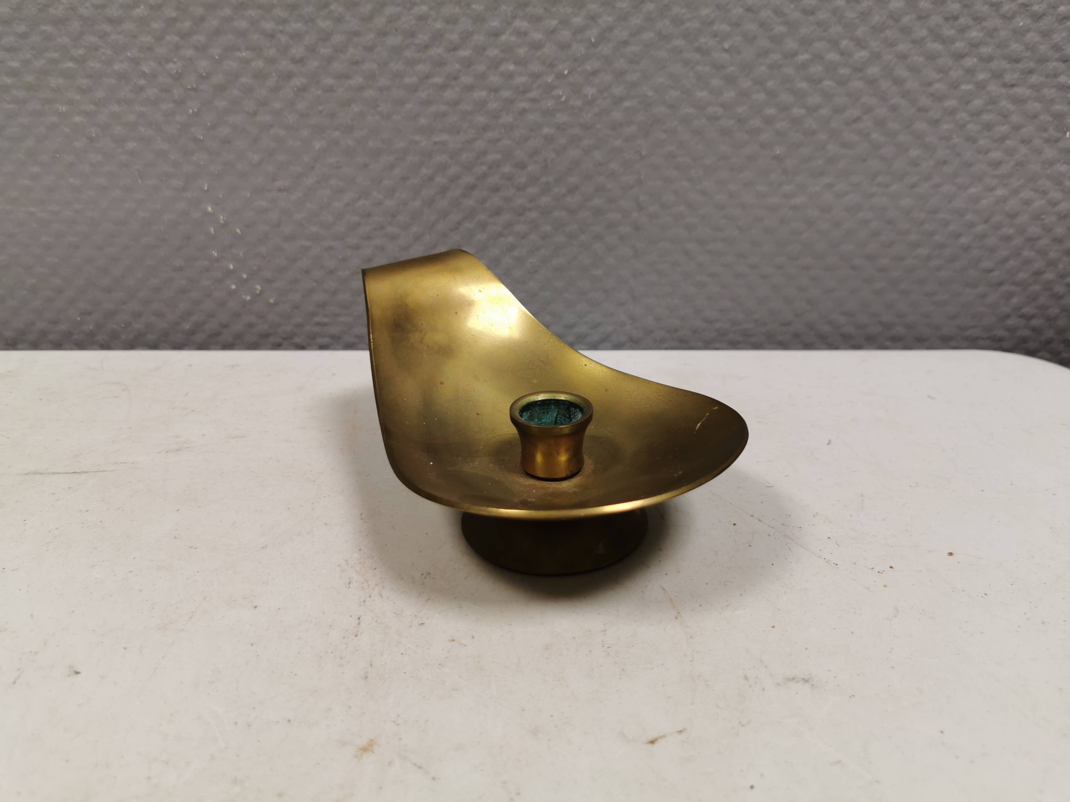 Brass candlestick for a single candle