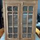 Small Parisian display case in raw wood