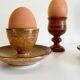 Trio of vintage ceramic and wood egg cups