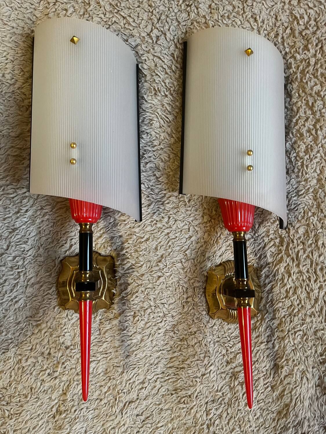 Pair of circa 70s plastic and brass wall lights