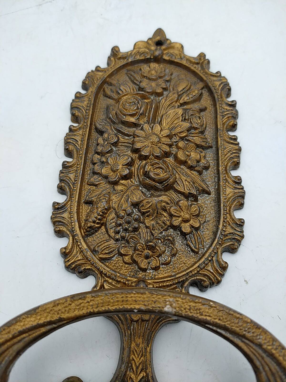 Brass coat rack with floral decoration