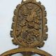 Brass coat rack with floral decoration