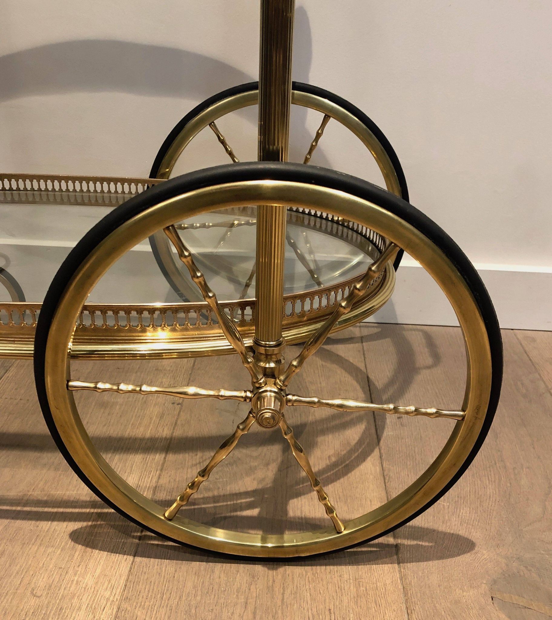 Oval brass trolley from Maison Baguès.