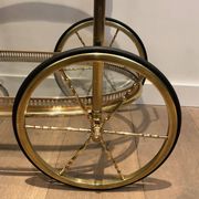 Oval brass trolley from Maison Baguès.