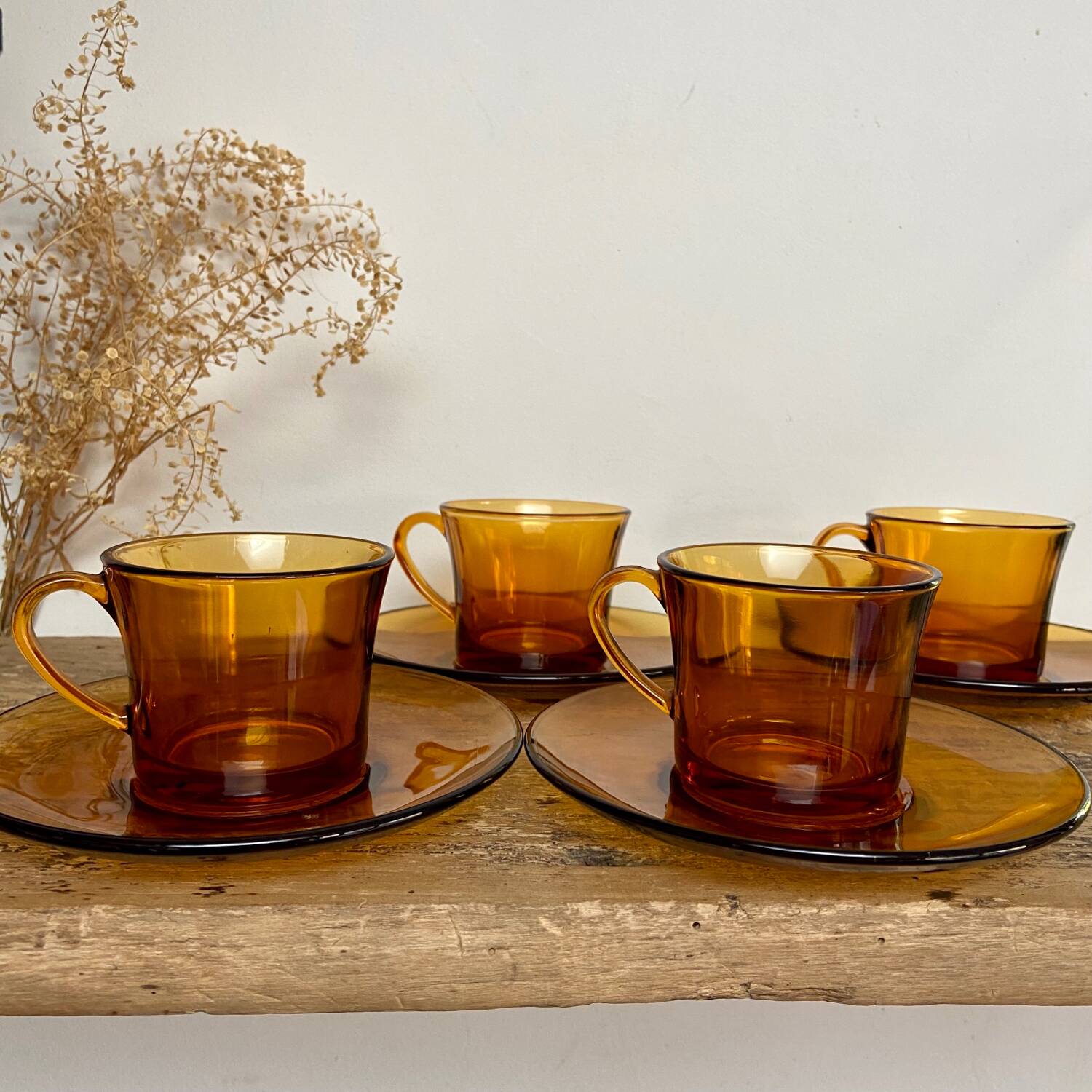 4 amber Duralex cups and saucers
