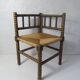 Old corner armchair beaded wood paillé