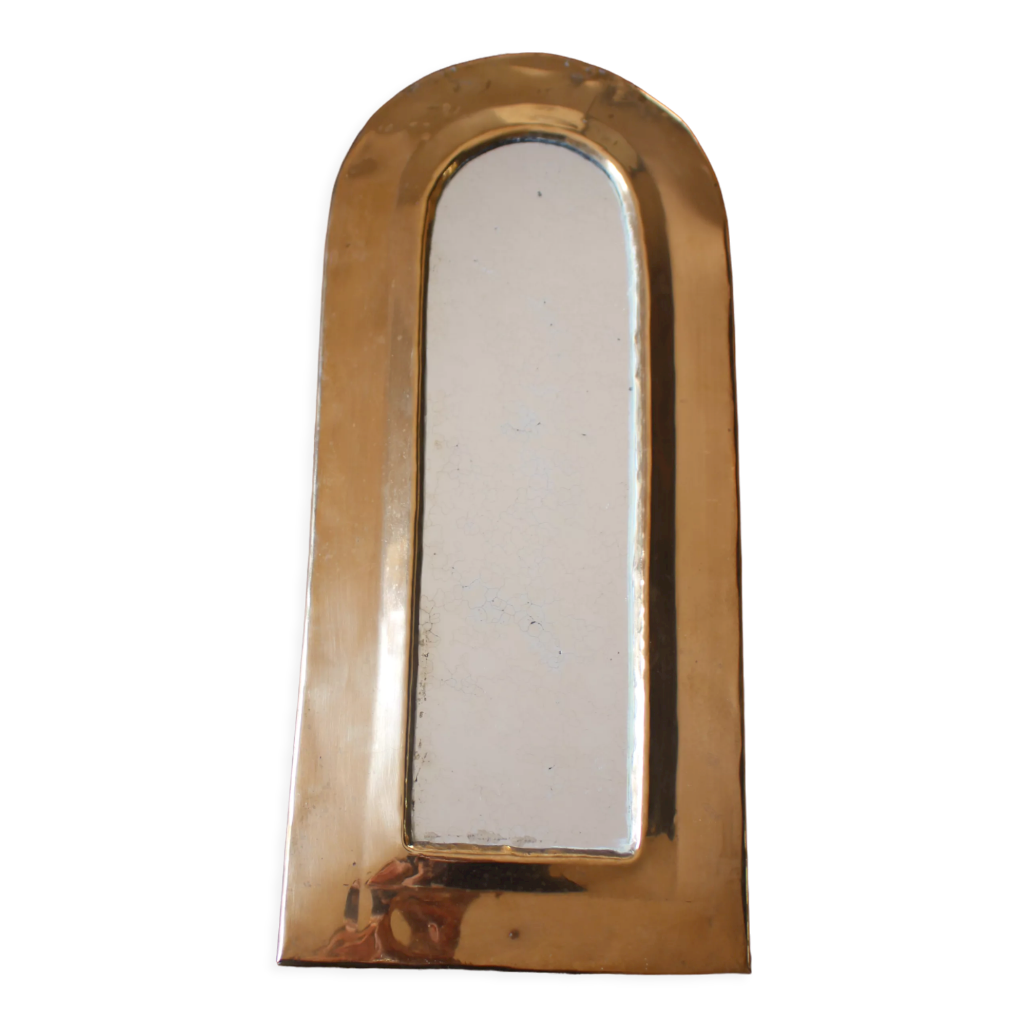 Rounded brass mirror